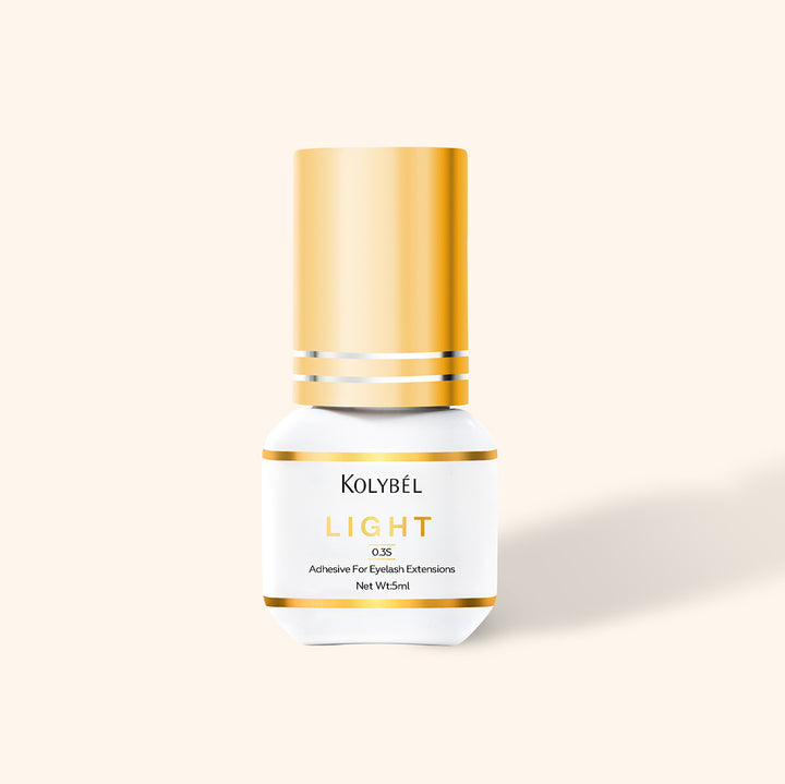 0.3 Second LIGHT Adhesive Eyelash Extension Glue (5ml)-kolybel-This professional eyelash extension adhesive offers ultra-fast 0.3 second drying time and long-lasting retention for experienced lash artists. Its non-toxic formula with glossy black finish is designed for use in controlled salon conditions to create durable, natural-looking lash sets.