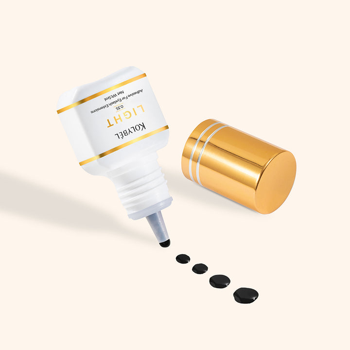 0.3 Second LIGHT Adhesive Eyelash Extension Glue (5ml)-kolybel-This professional eyelash extension adhesive offers ultra-fast 0.3 second drying time and long-lasting retention for experienced lash artists. Its non-toxic formula with glossy black finish is designed for use in controlled salon conditions to create durable, natural-looking lash sets.