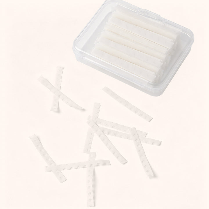 500-sheet lash lift paper covers for professional use. Lint-free, pre-cut strips ensure even reagent distribution and secure lash placement